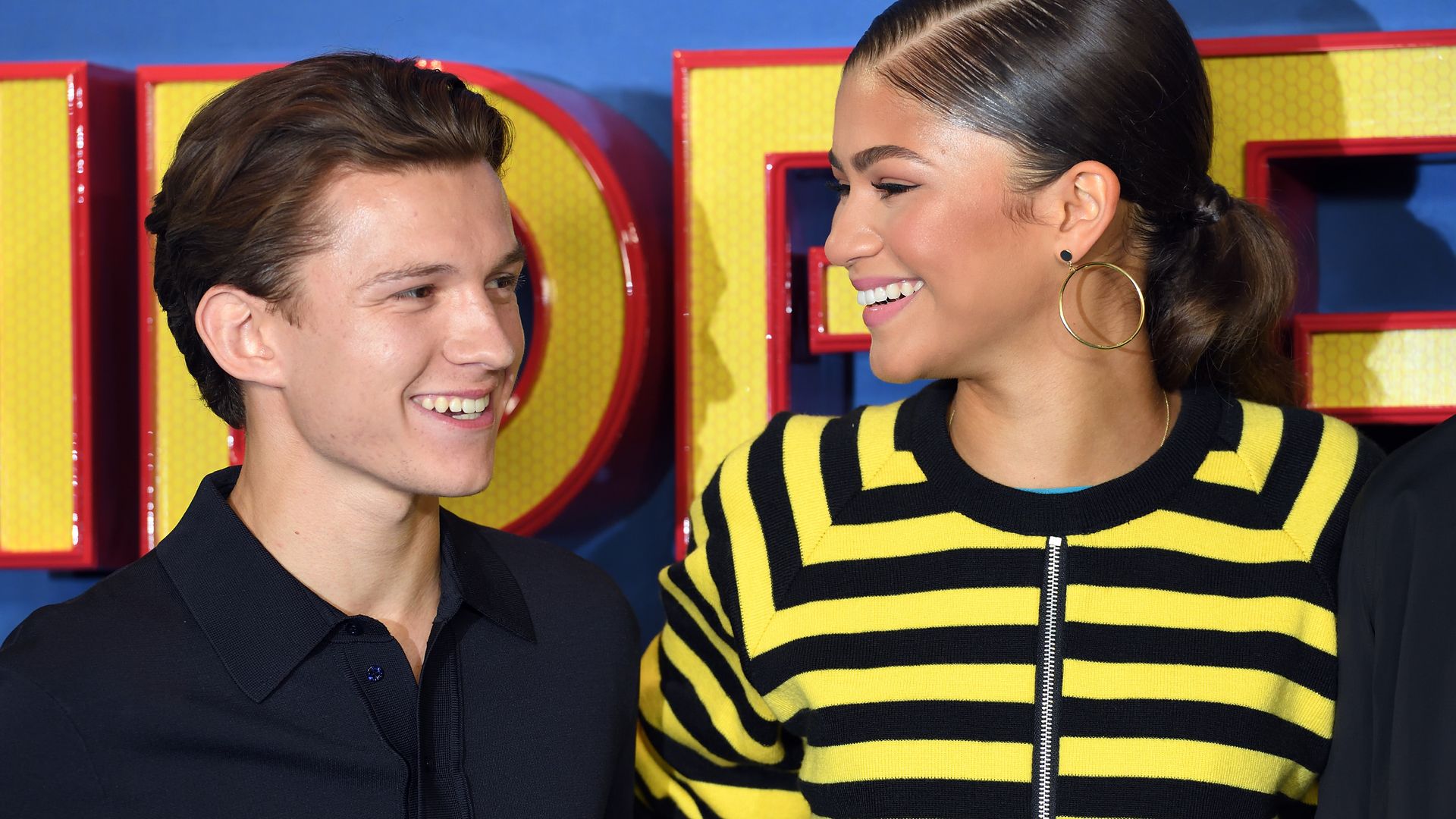 Zendaya and Tom in June 2017 laughing and smiling at each other