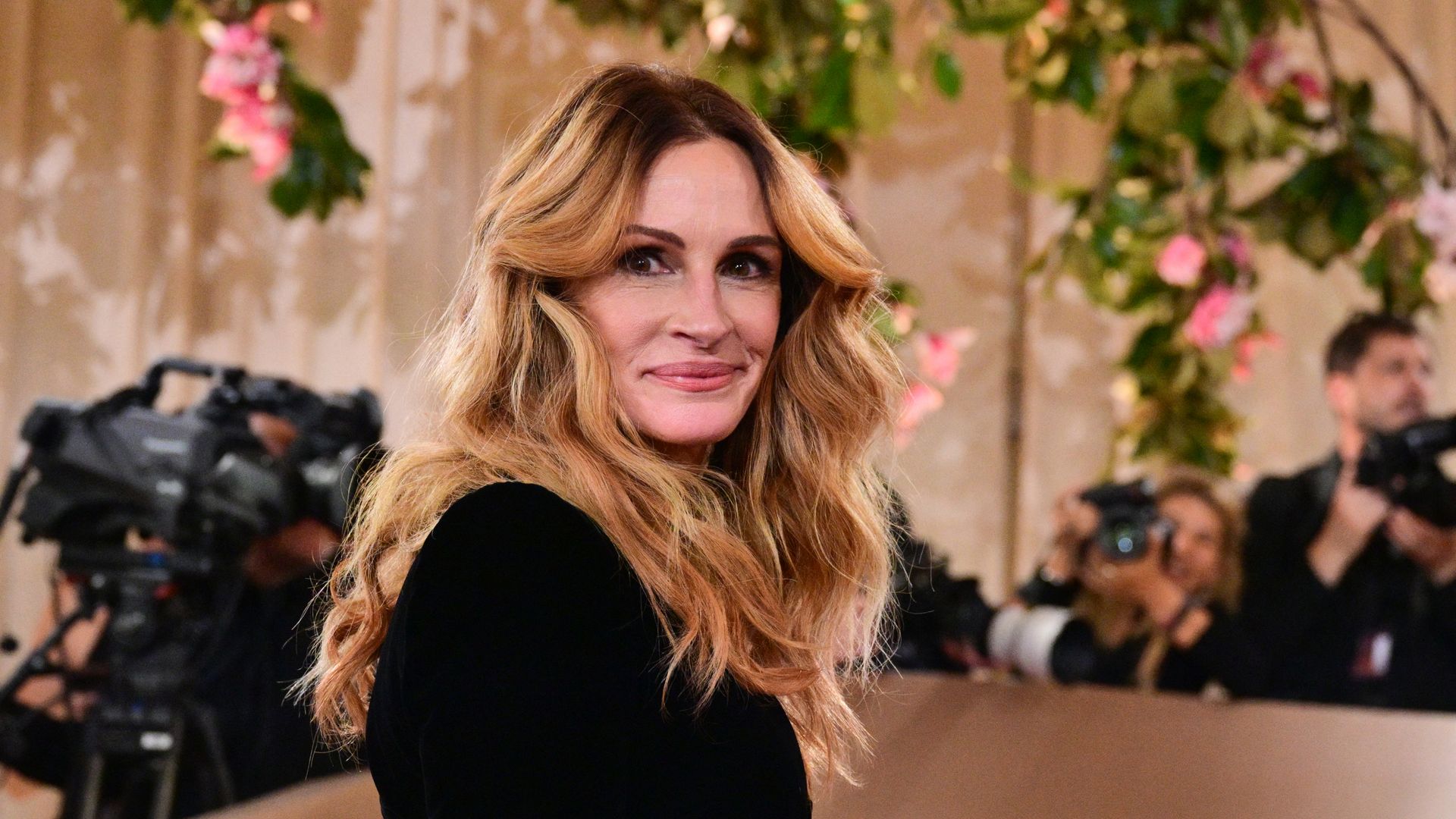 Julia Roberts looks radiant on the red carpet in plunging black gown