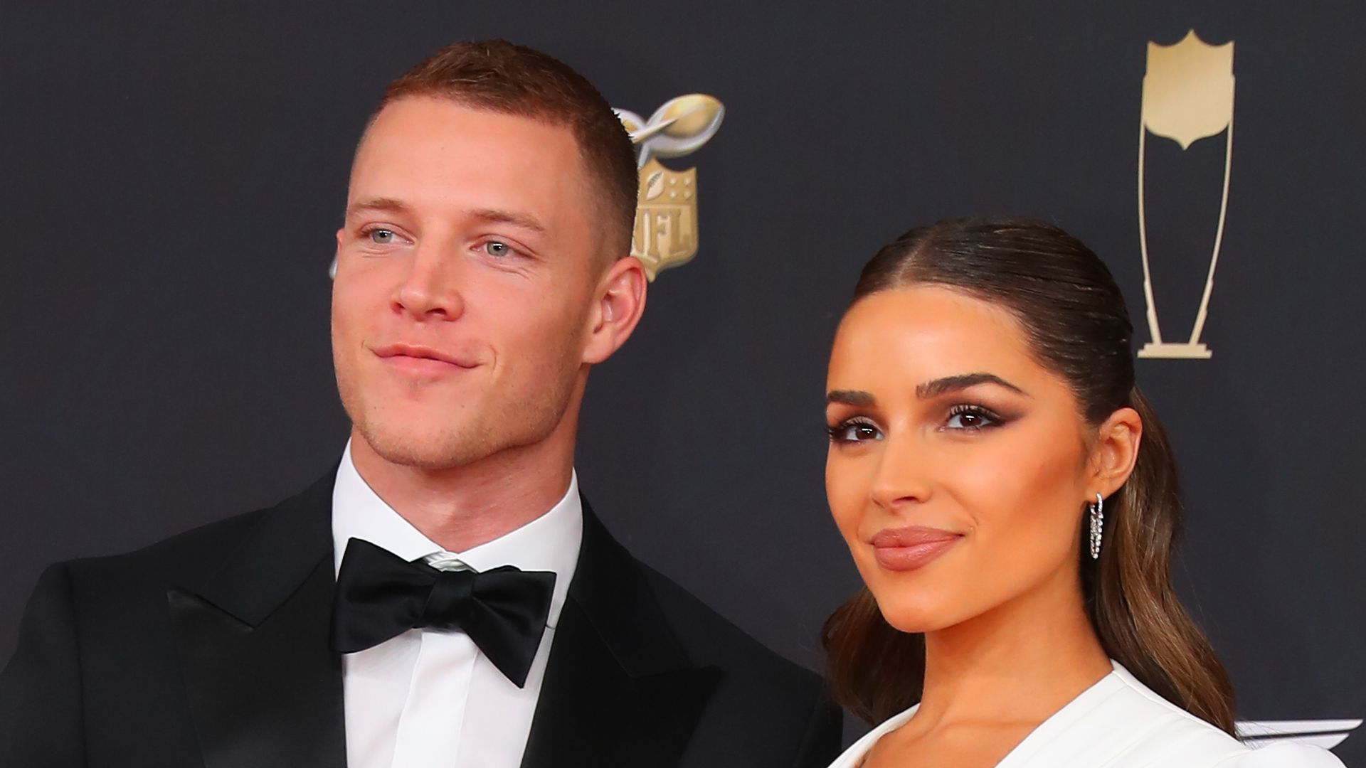 Carolina Panthers running back Christian McCaffrey  and Olivia Culpo pose on the Red Carpet poses prior to the NFL Honors on February 1, 2020 at the Adrienne Arsht Center in Miami, FL
