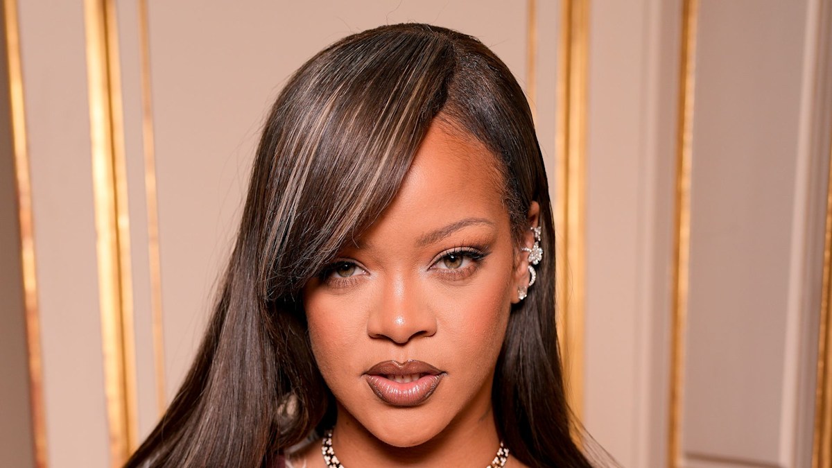 Rihanna rocks corseted mini dress and incredible transformed hair