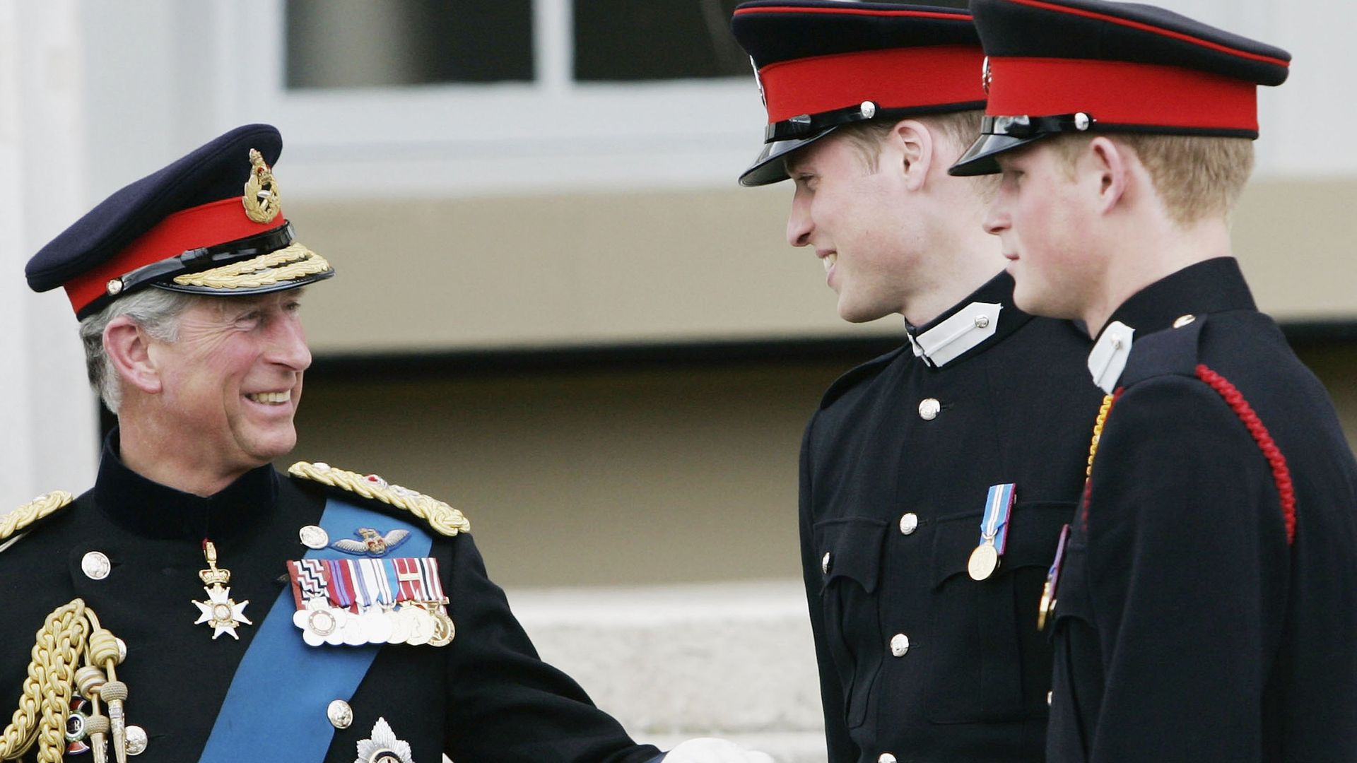 King Charles alongside his two sons, William and Harry at the Sandhurst Sovereign Parade