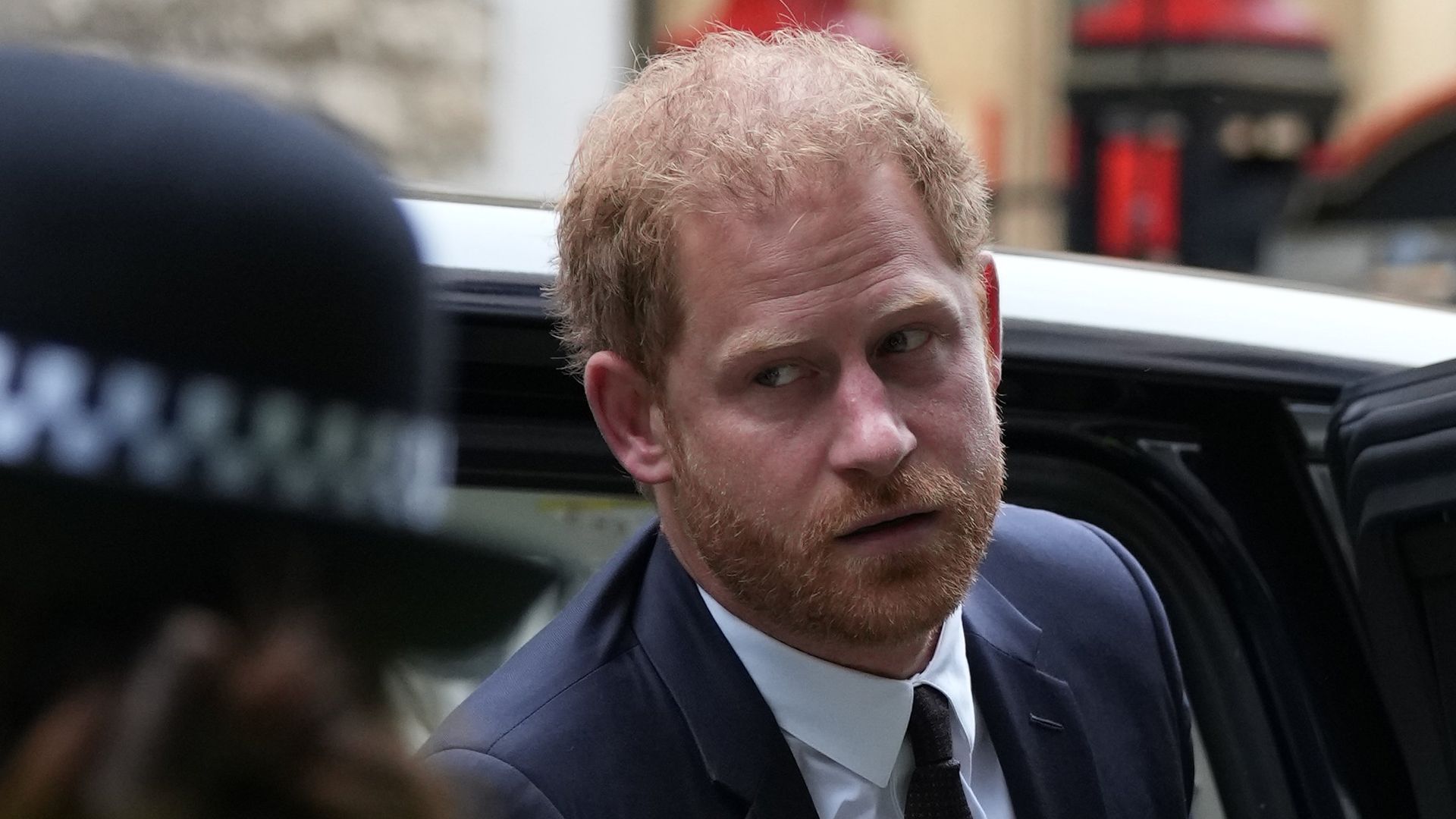 Prince Harry looking downcast at court 