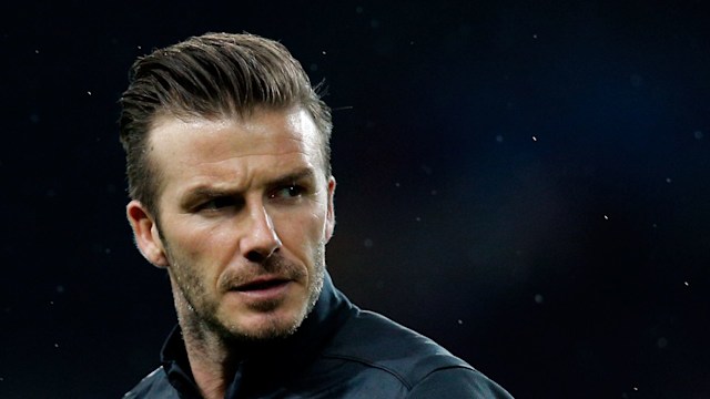 David Beckham of PSG warms up prior to the Round of 16 UEFA Champions League match between Paris St Germain and Valencia CF at Parc des Princes on March 6, 2013 in Paris, France.