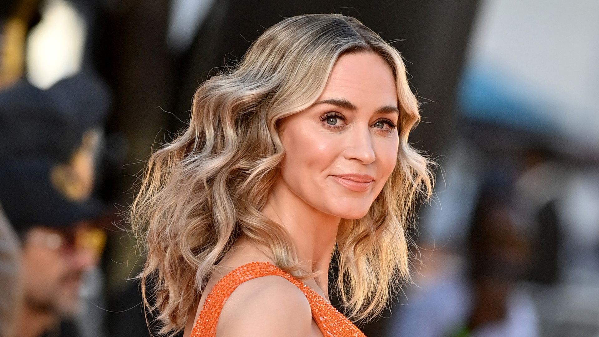 Emily Blunt's dazzling orange cut-out dress is bang on trend for summer 2024