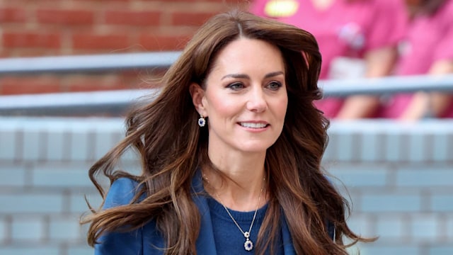 Kate Middleton wearing blue suit at Evelina London