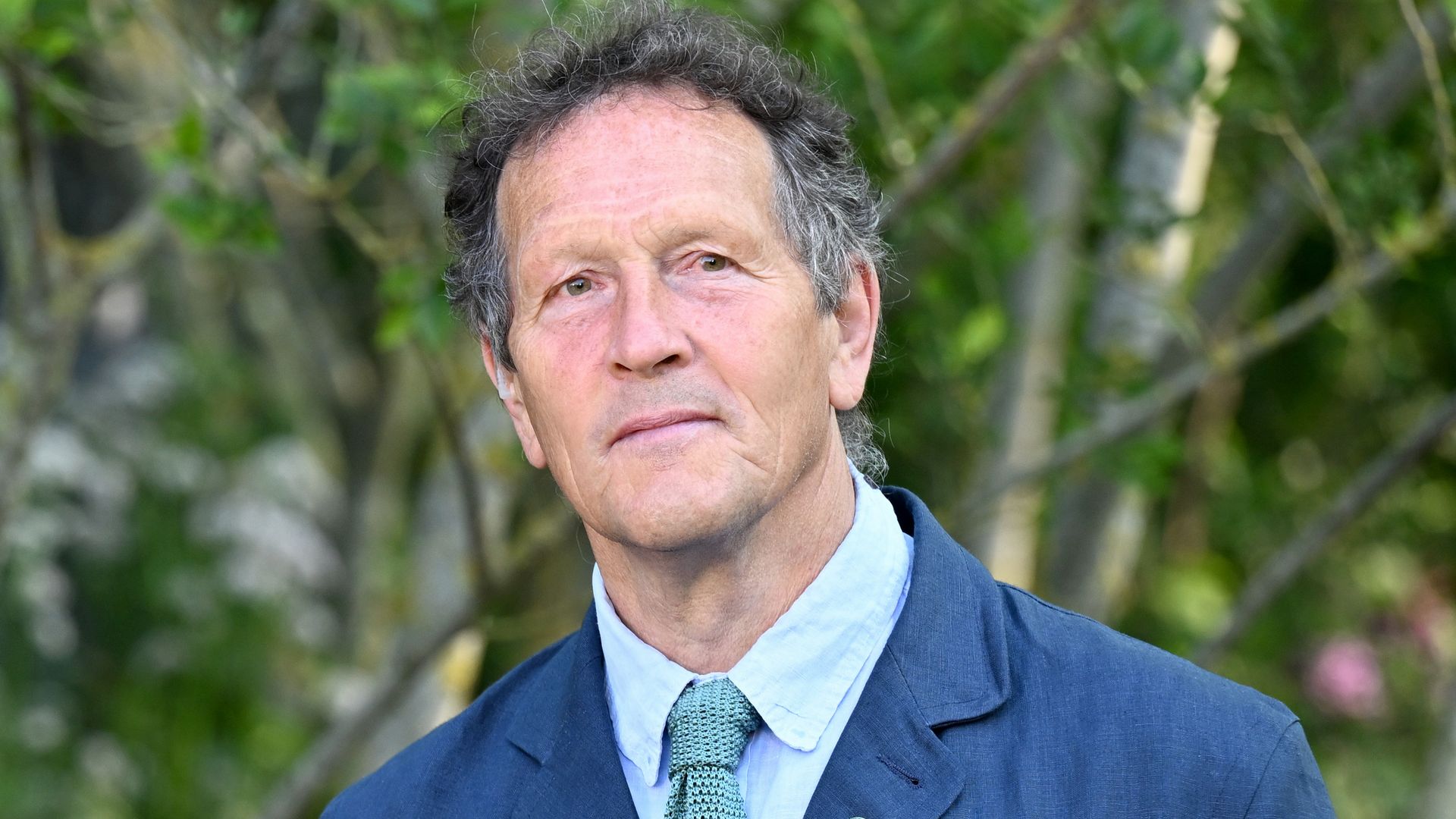 Joe Swift and Monty Don  talk in linen suits