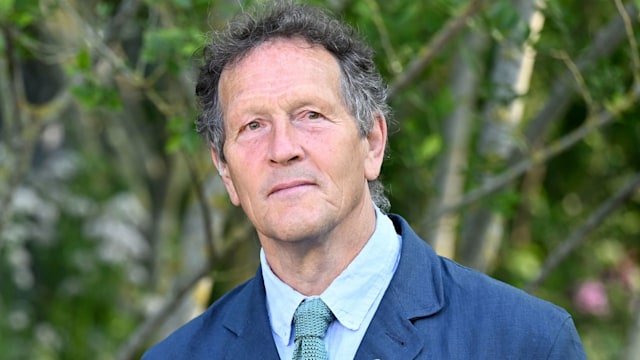 Joe Swift and Monty Don  talk in linen suits