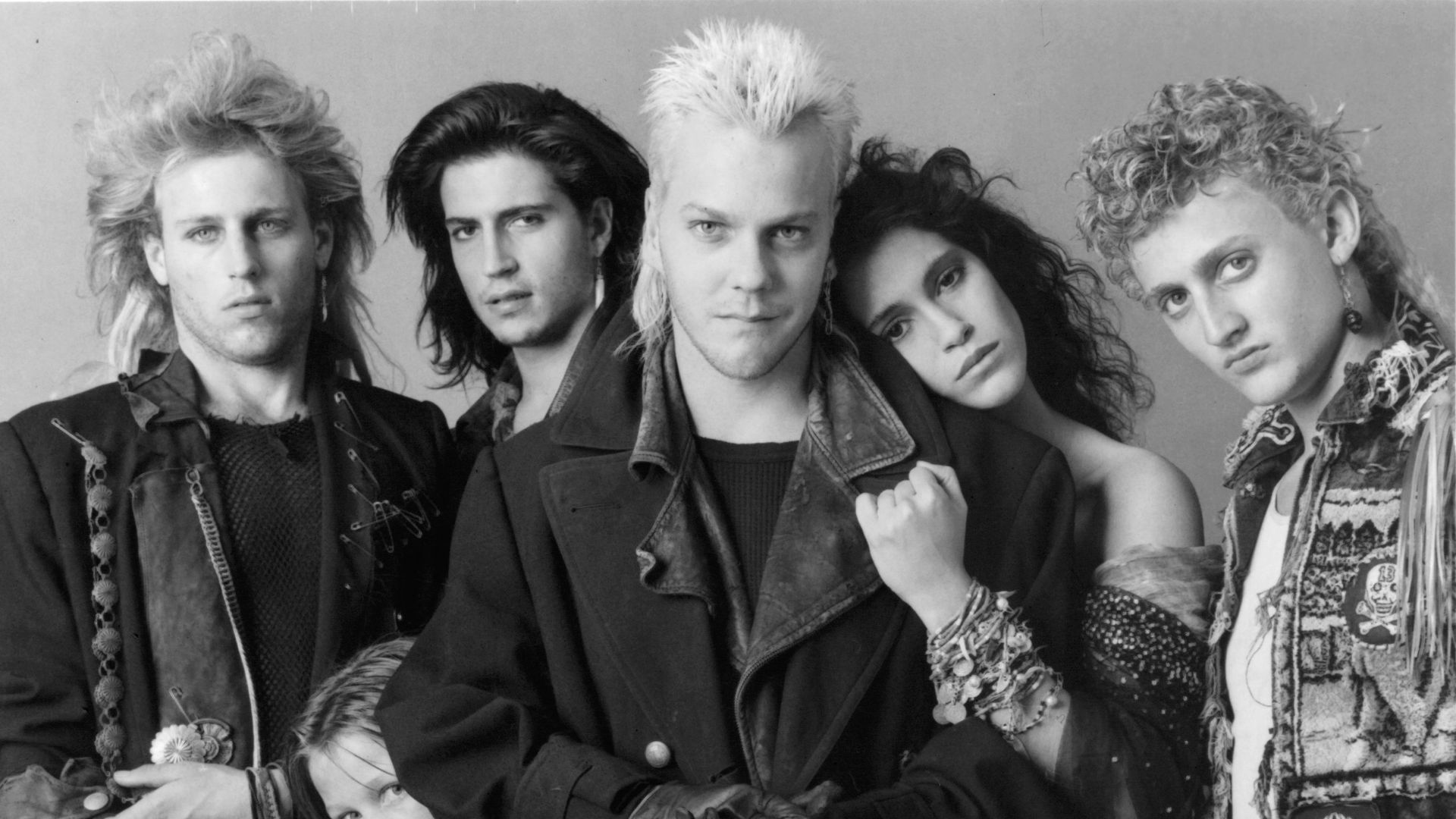 Jami in The Lost Boys poster with Kiefer Sutherland and the rest of the cast