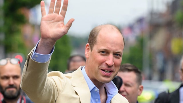 Prince William, Prince of Wales waves as he visits the East Belfast Mission at the Skainos Centre as part of his tour of the UK to launch a project aimed at ending homelessness on June 27, 2023 in Belfast, United Kingdom. The Prince of Wales has launched Homeward, a five-year programme delivered by the Royal Foundation, which will aim to demonstrate the possibility of ending homelessness. He is currently on a 2 day tour of the United Kingdom, visiting charities working to prevent homelessness in England, Scotland and Wales.  (Photo by Tim Rooke -Pool/Getty Images)