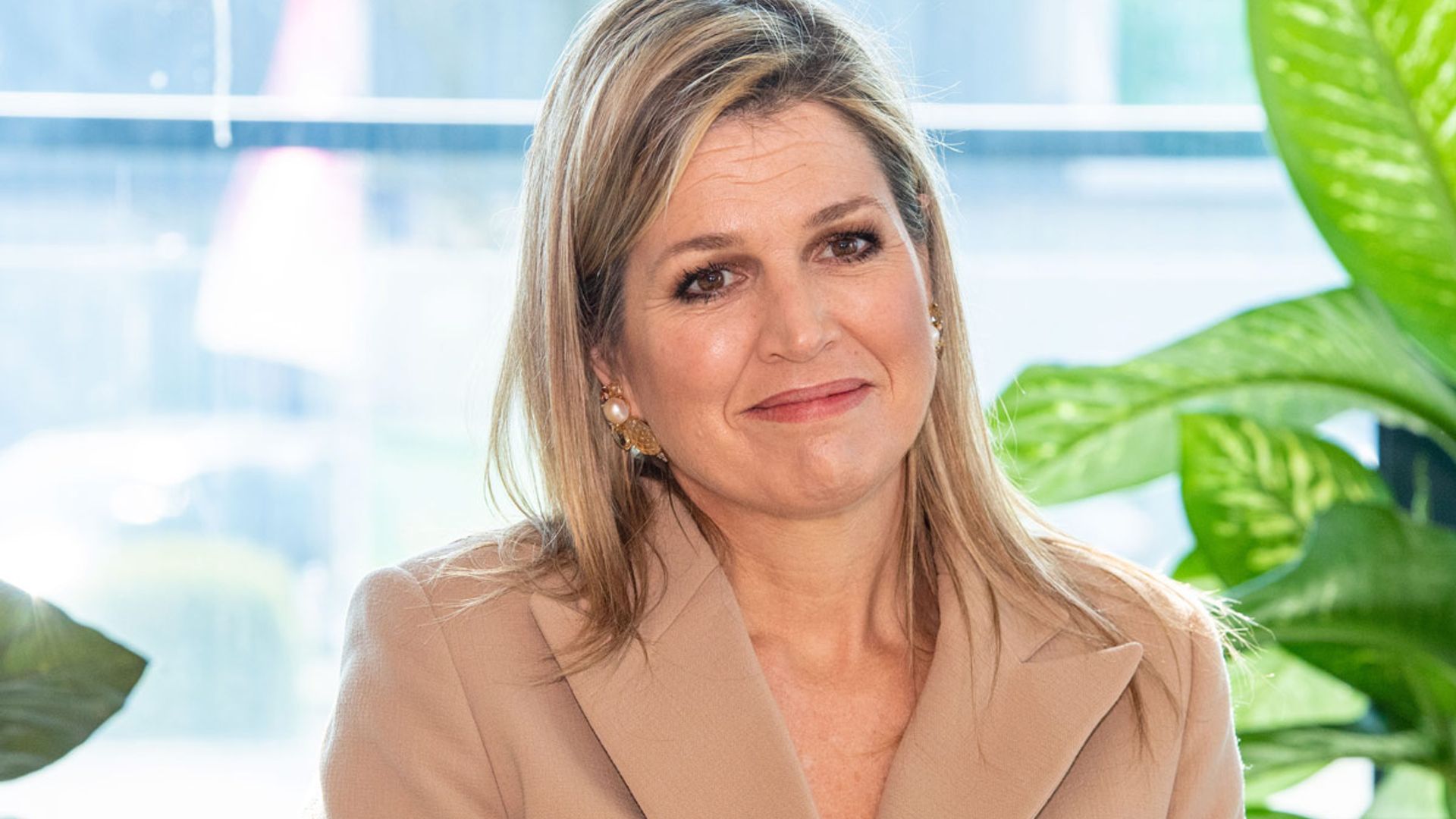 Queen Maxima surprises with royal engagement amid coronavirus - and her waist-cinching suit is beautiful