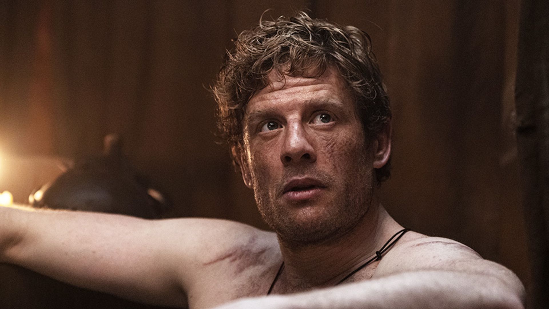 man sitting in bath tub