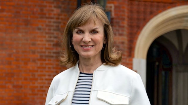 female tv presenter smiling