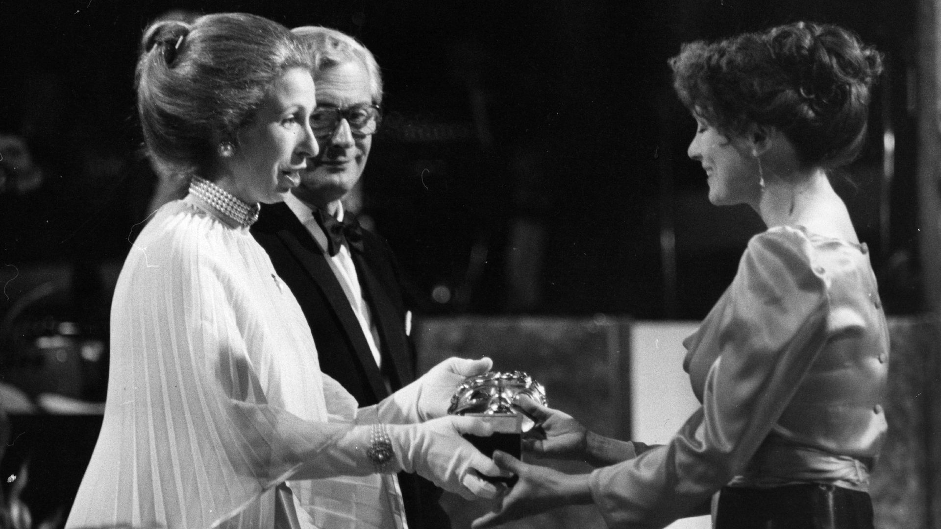 A BAFTA award being presented by HRH Princess Anne to Francesca Annis for her part in The Comedy of Errors