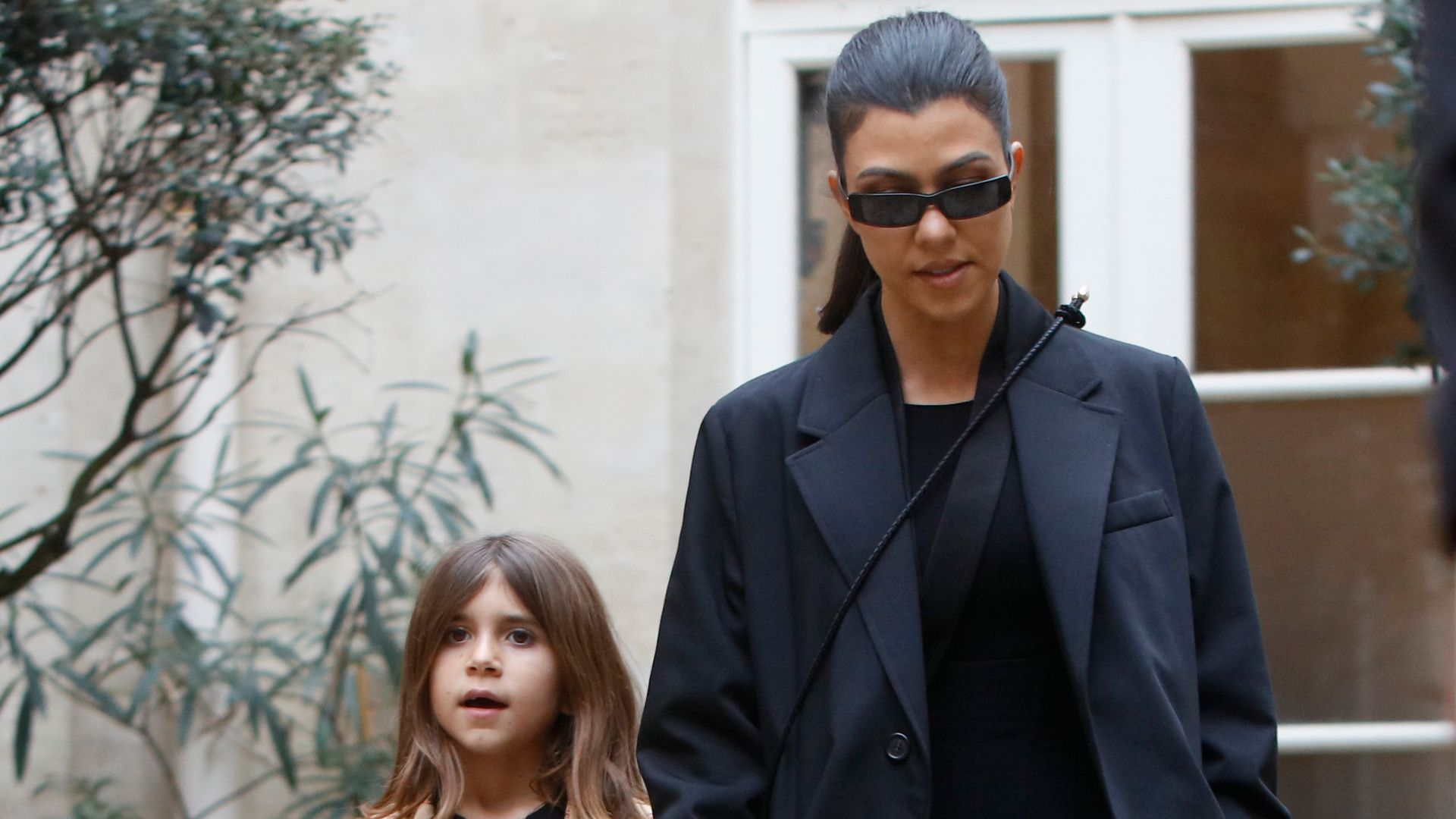 Kourtney Kardashian, her daughter Penelope Disick pictured at the Cafe de Flore in Paris March 02, 2020 in Paris, France.  (Photo by Mehdi Taamallah/NurPhoto via Getty Images)