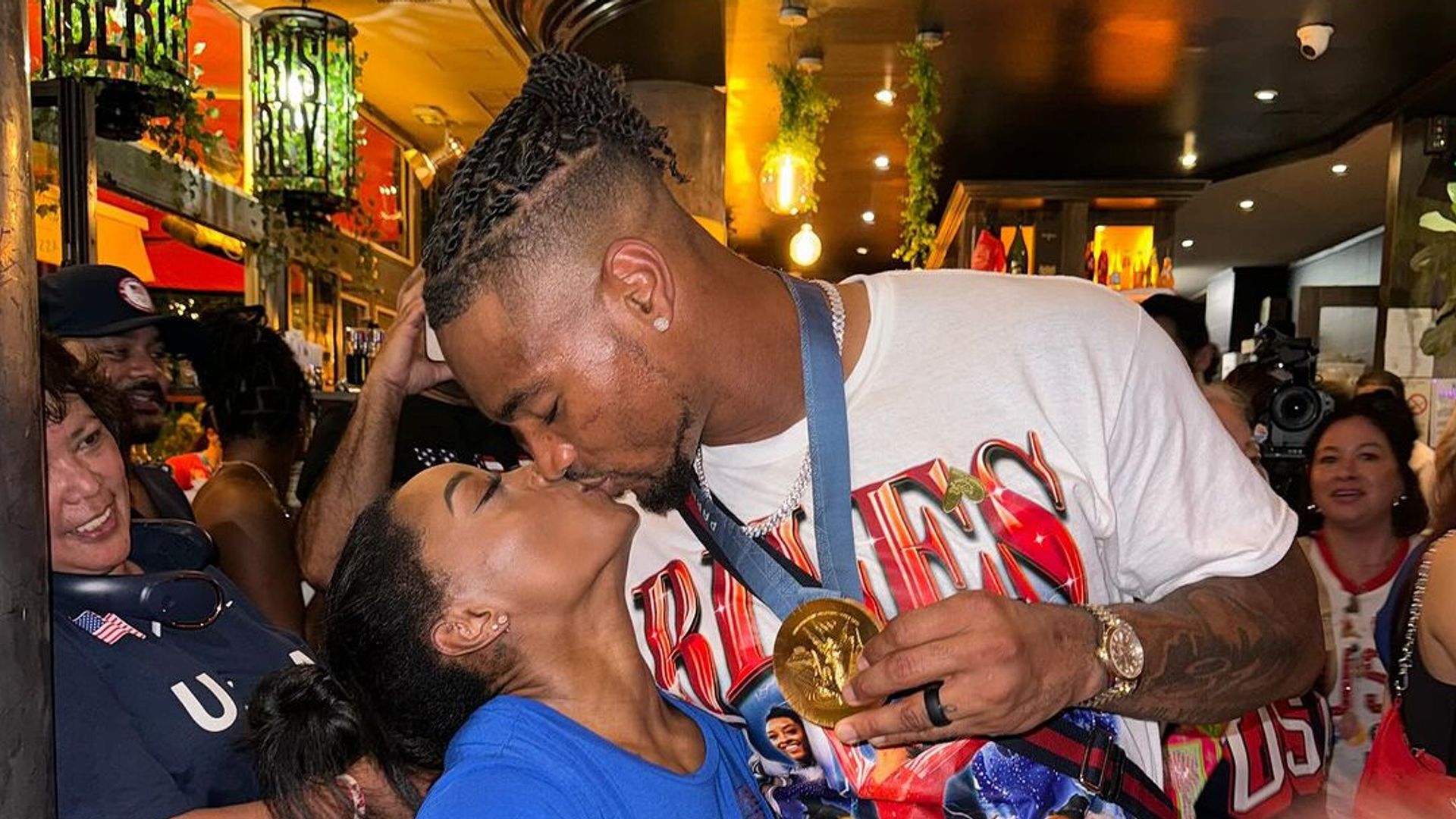 Simone Biles' husband Jonathan Owens proudly kisses his wife as she makes Olympic history | HELLO!