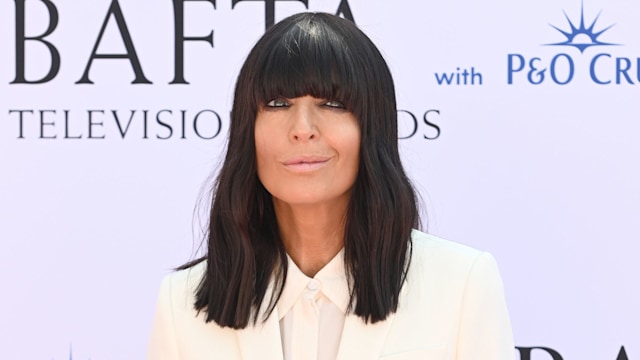 claudia winkleman in white suit 