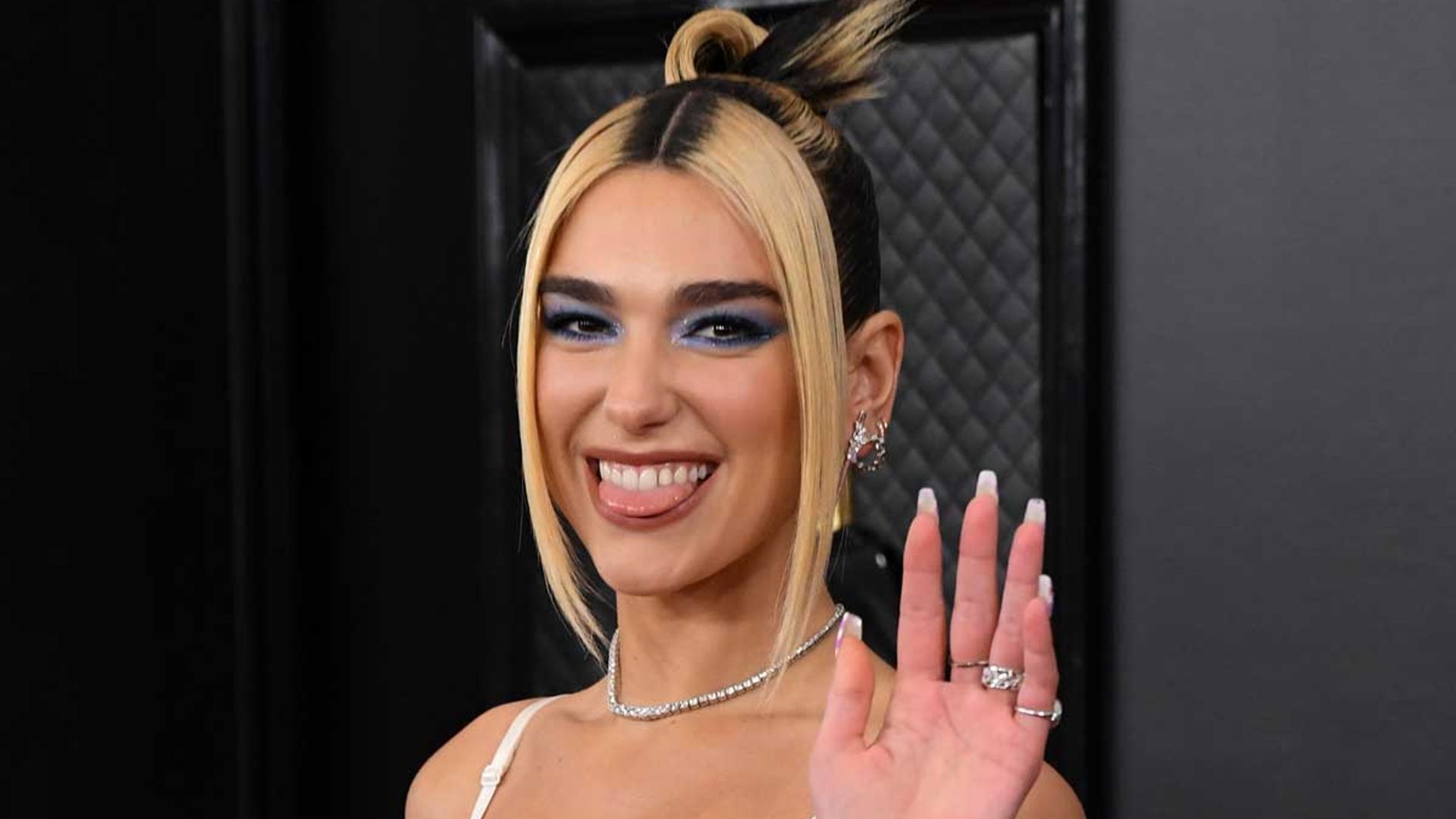 Dua Lipa braves travel restrictions and stuns in statement jacket in Mexico