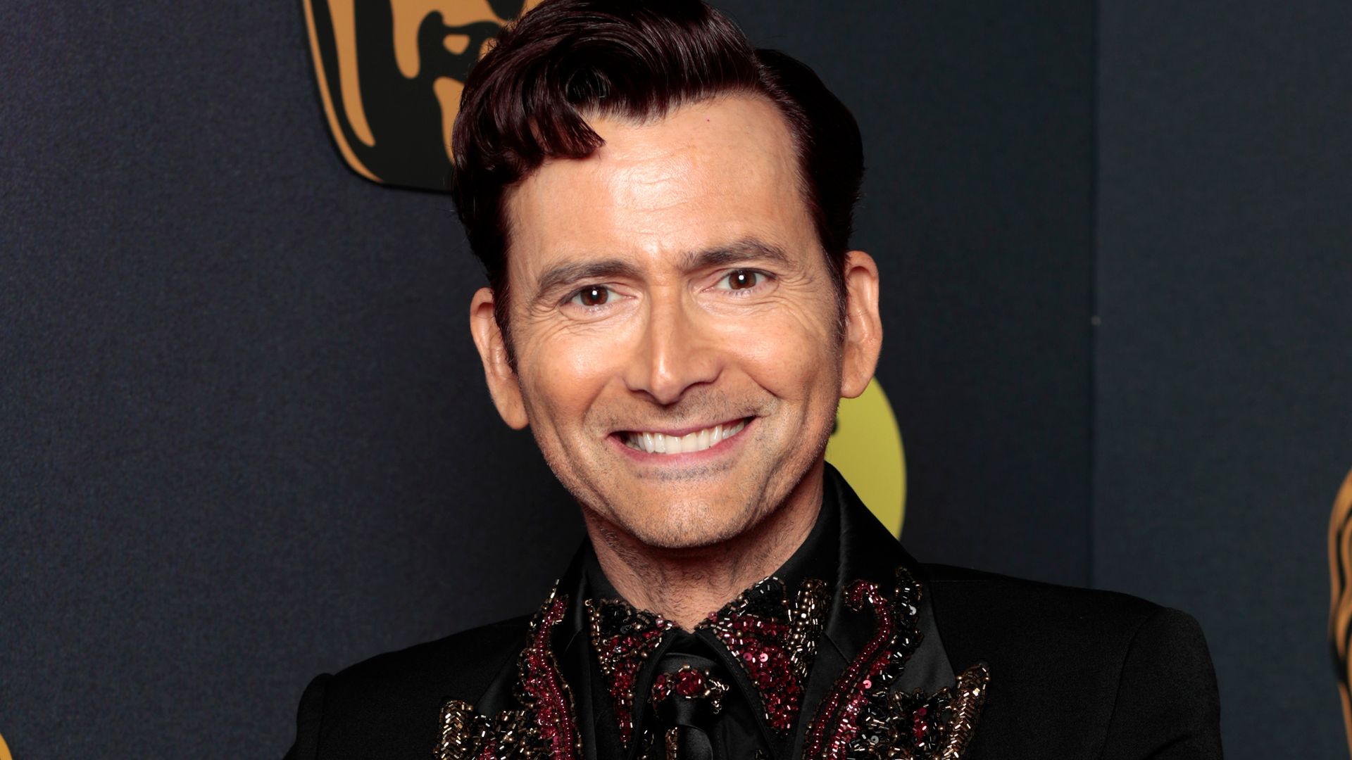 Host David Tennant attends the EE BAFTA Film Awards 2025 at The Royal Festival Hall on February 16, 2025 in London, England