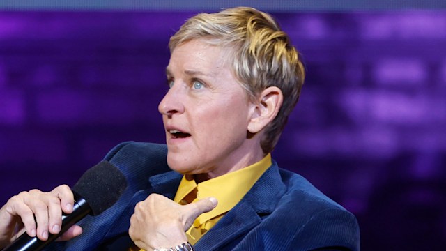 Ellen DeGeneres speaks with a microphone onstage during the Michelle Obama: The Light We Carry Tour at Warner Theatre on November 15, 2022 in Washington, DC