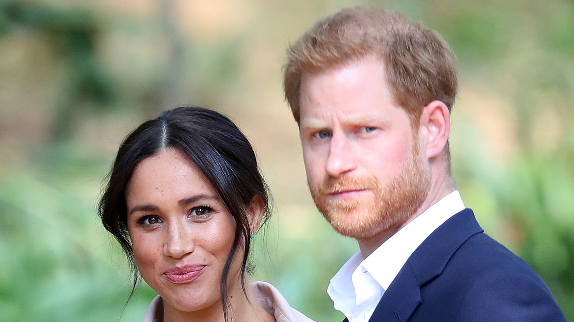 prince harry and meghan marke in park 