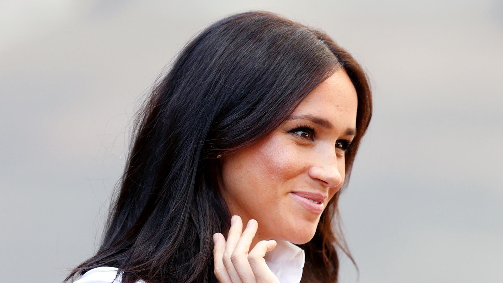 Meghan, Duchess of Sussex in white shirt