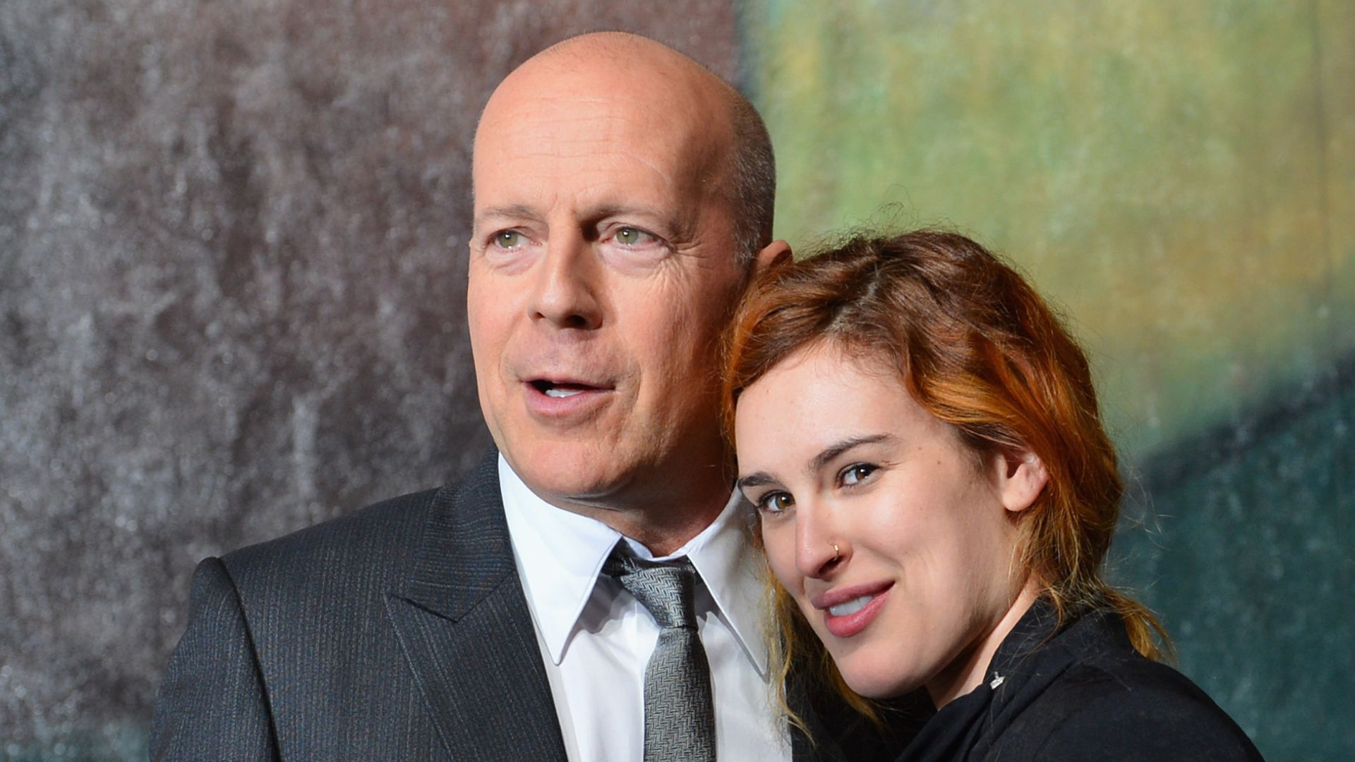 Bruce Willis and actress Rumer Willis attend the dedication and unveiling of a new soundstage mural celebrating 25 years of "Die Hard" at Fox Studio Lot on January 31, 2013 in Century City, California