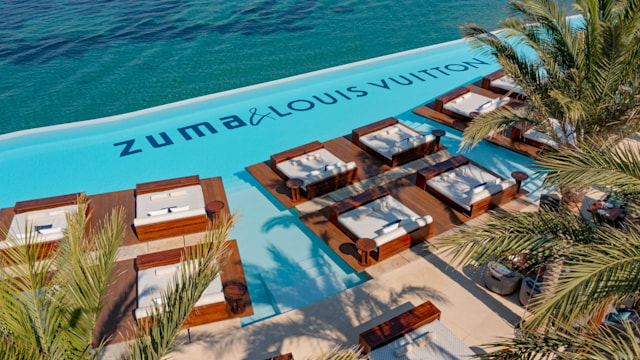 Pool with 'Zuma & Louis Vuitton' written underwater 