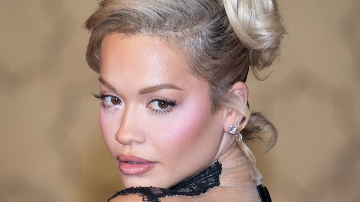 Rita Ora opts for yet another plunging neckline in gothic backless gown