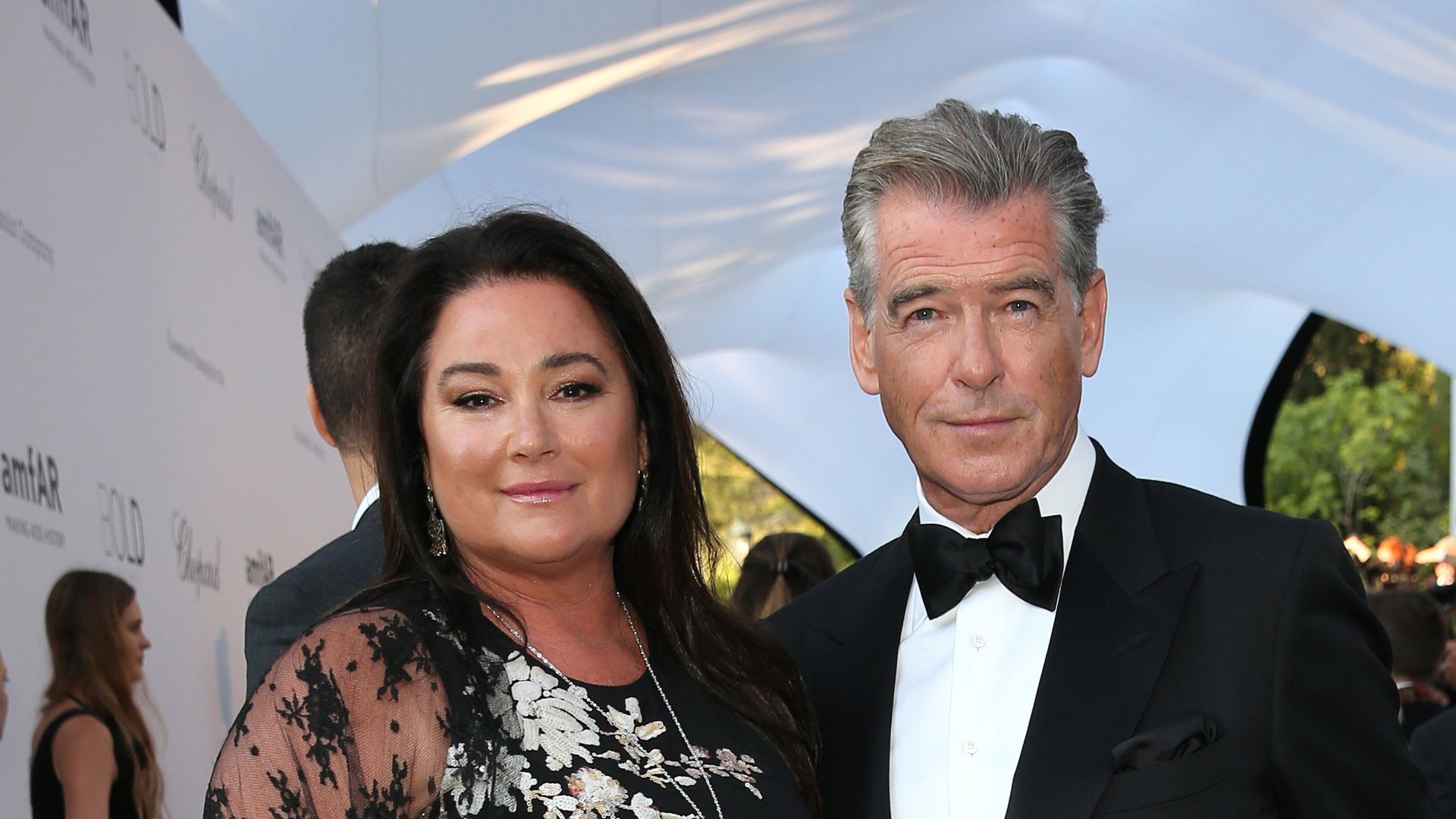 Keely Shaye Smith and Pierce Brosnan arrive at the amfAR Gala Cannes 2018 at Hotel du Cap-Eden-Roc on May 17, 2018 in Cap d'Antibes, France