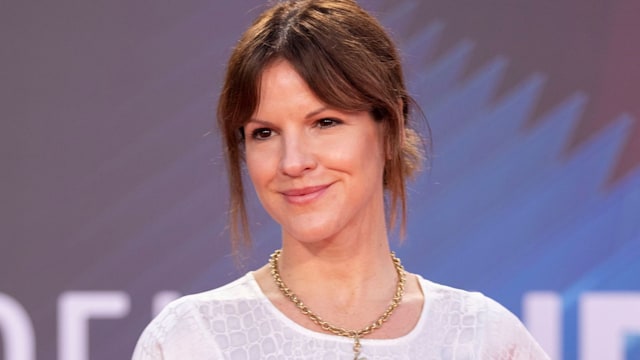 Sting's daughter Fuschia Sumner in a white dress
