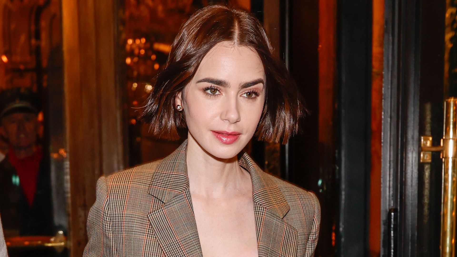 Lily Collins' Emily in Paris press wardrobe is a lesson in It-girl winter dressing