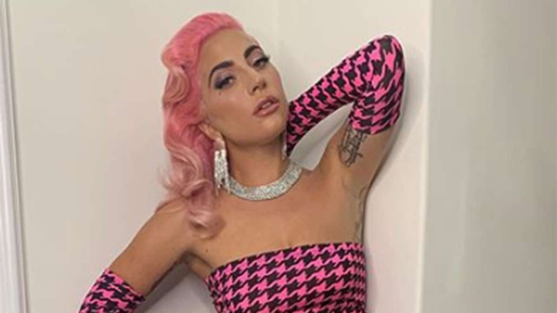 Lady Gaga matches her hair to her pink bridesmaid dress at best friend's wedding