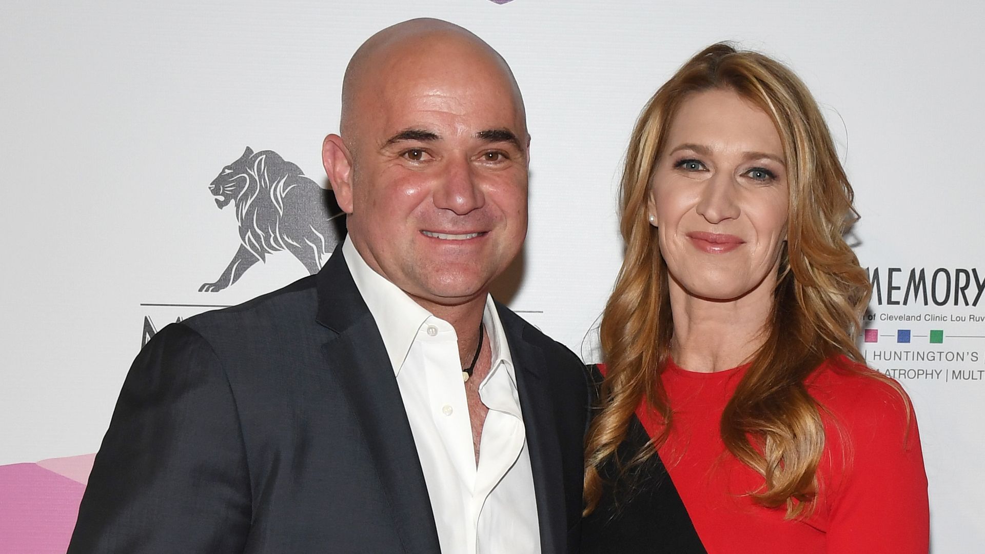 Andre Agassi standing with Steffi Graf