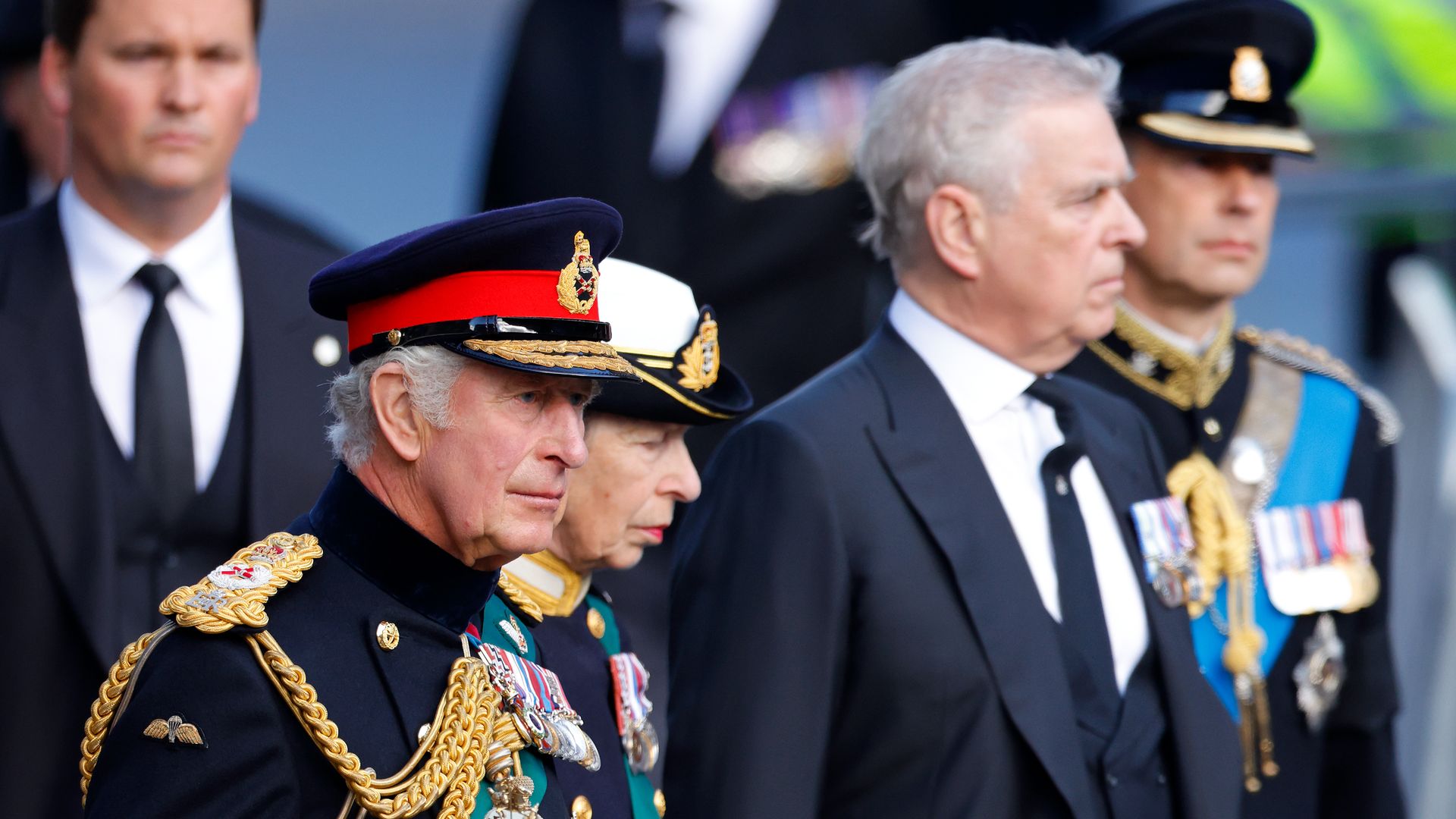 King Charles III, Princess Anne, Prince Andrew, and Prince Edward walk along The Royal Mile as they accompany Queen Elizabeth II's coffin to St Giles' Cathedral for a Service of Thanksgiving
