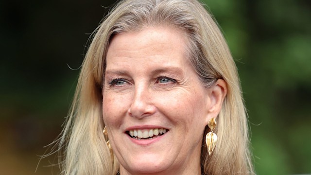 Sophie, Duchess Of Edinburgh smiling in brown blazer