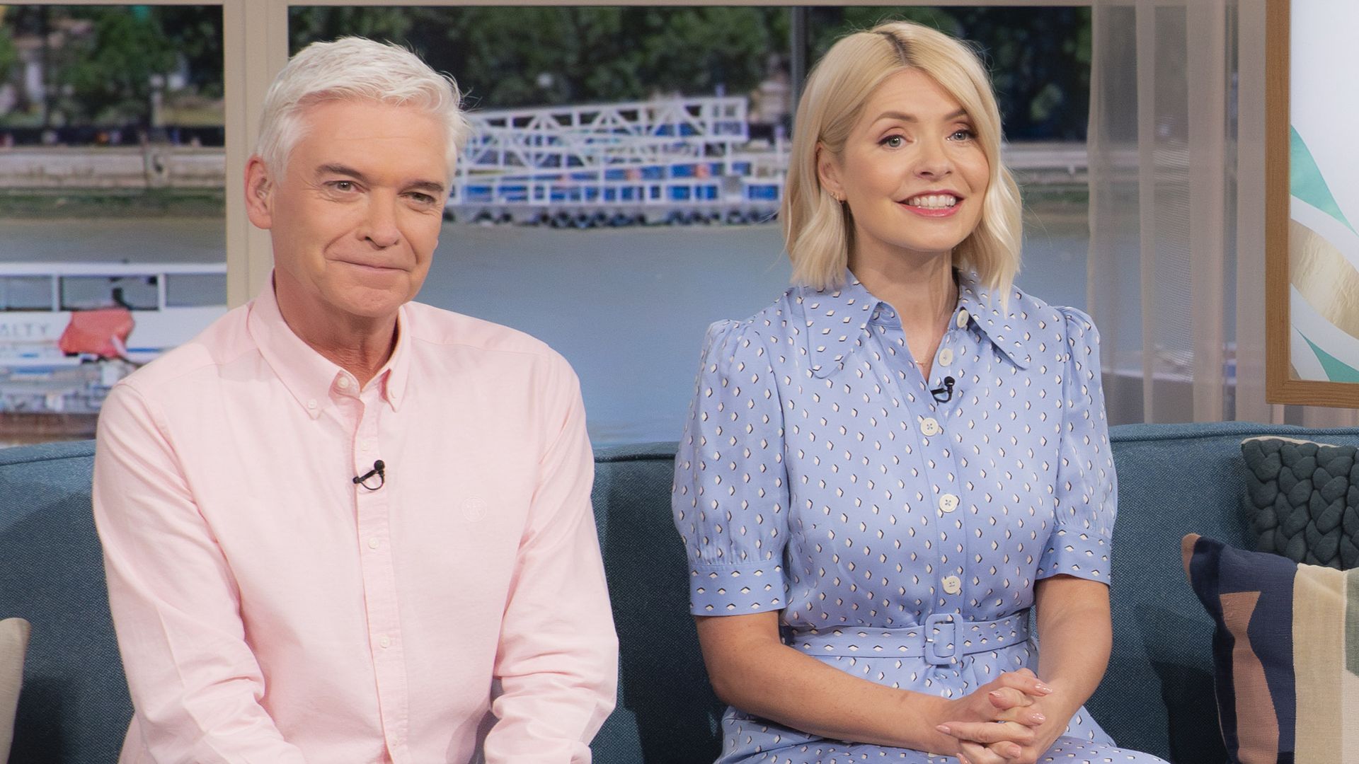 Phillip Schofield and Holly Willoughby sat on a sofa