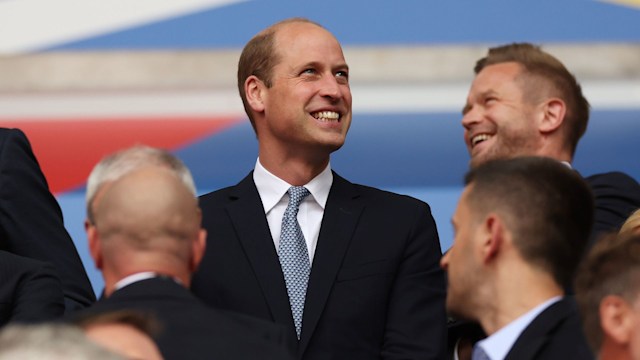 Prince William smiling in the crowd at England quarterfinal match