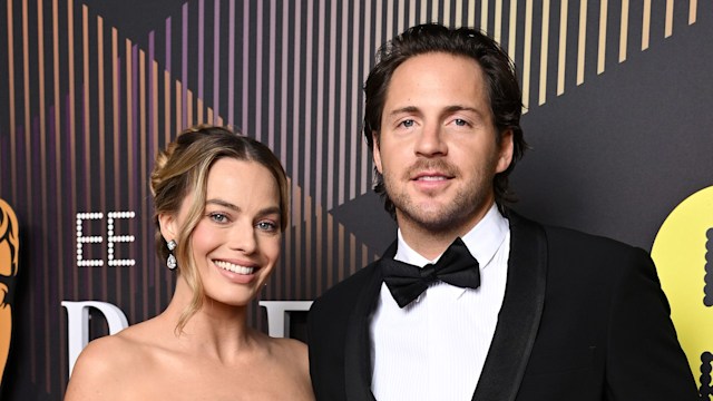 Margot Robbie and Tom Ackerley attend the 2024 EE BAFTA Film Awards at The Royal Festival Hall on February 18, 2024 in London, England.