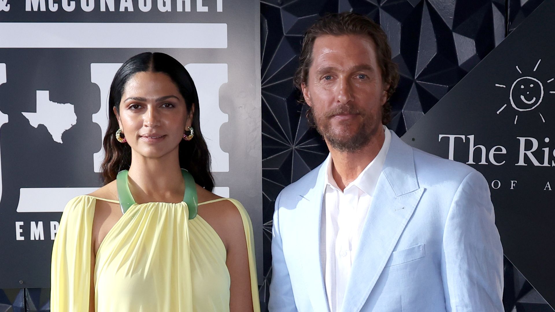 Matthew McConaughey's lookalike son, 14, almost towers over his parents ...