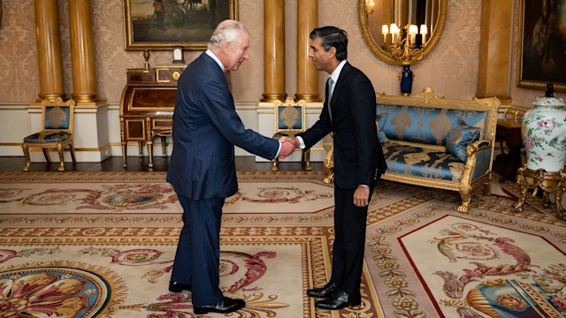 King Charles III welcomes Rishi Sunak during an audience at Buckingham Palace