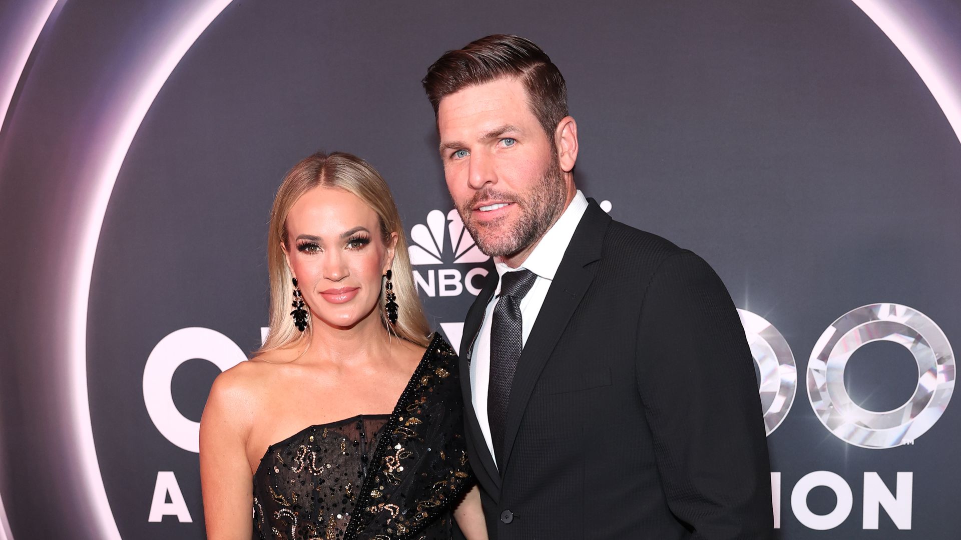 Carrie Underwood looks sensational as she makes rare red carpet appearance with husband Mike Fisher