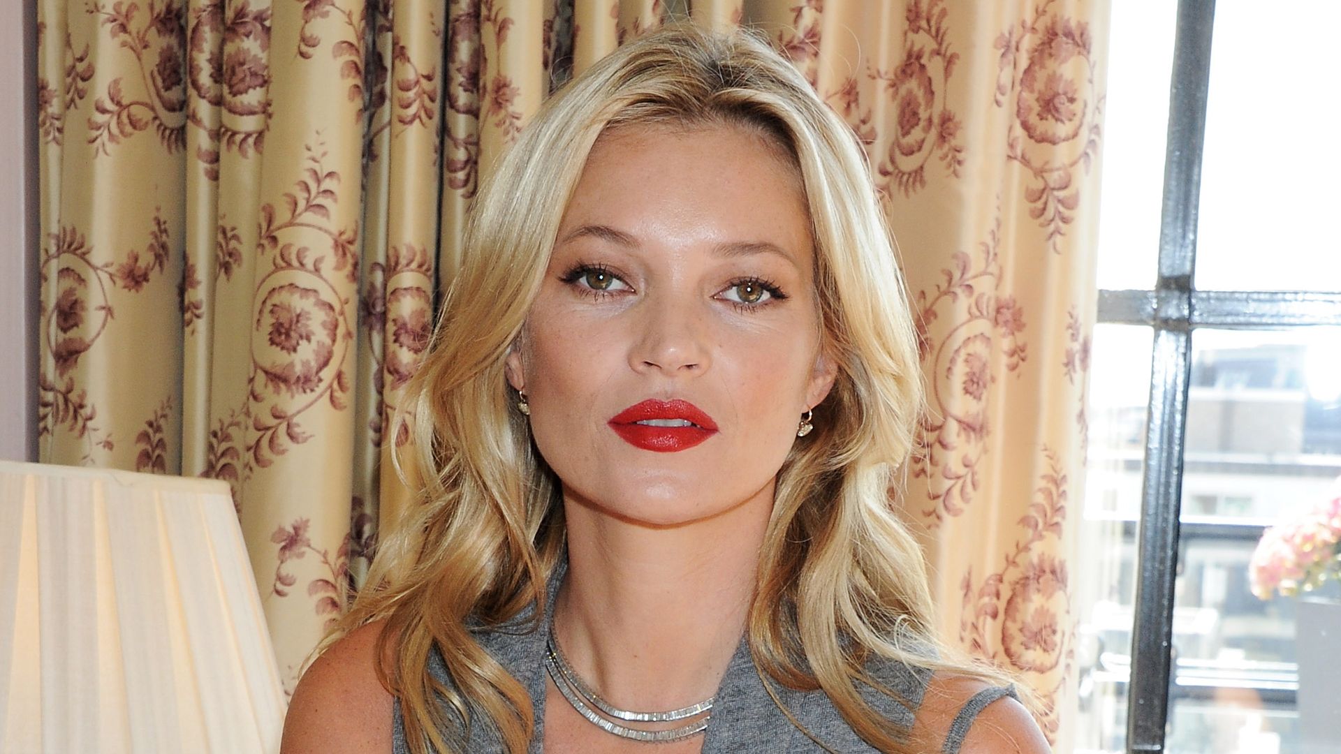 LONDON, ENGLAND - SEPTEMBER 15:  Rimmel celebrates its 10 year partnership with original London girl Kate Moss, who today launches her personally designed lipstick range for the brand "Kate Moss Lasting Finish Lipstick Collection" at Claridges Hotel on September 15, 2011 in London, England.  Kate wears shade No.1 from her collection.  (Photo by Dave M. Benett/Getty Images for Rimmel)
