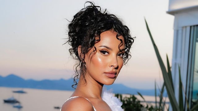 Maya Jama poses in a white lace dress on her Instagram 