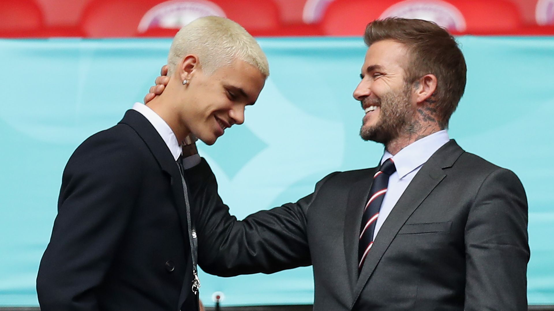 Romeo James Beckham and his father, David Beckham react during the UEFA Euro 2020 Championship Round of 16 match between England and Germany at Wembley Stadium on June 29, 2021 