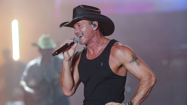 Tim McGraw stage cowboy hat vest