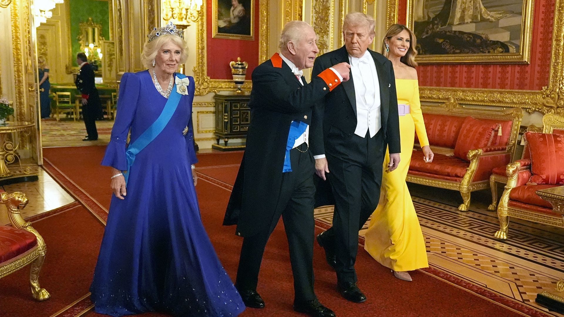Britain's Queen Camilla, Britain's King Charles III, US President Donald Trump and US First Lady Melania Trump arrive to attend a State Banquet at Windsor Castle, in Windsor, on September 17, 2025, during the US President's second State Visit. US President Donald Trump arrived in Britain for an unprecedented second State Visit, with the UK government rolling out a royal red carpet welcome to win over the mercurial leader