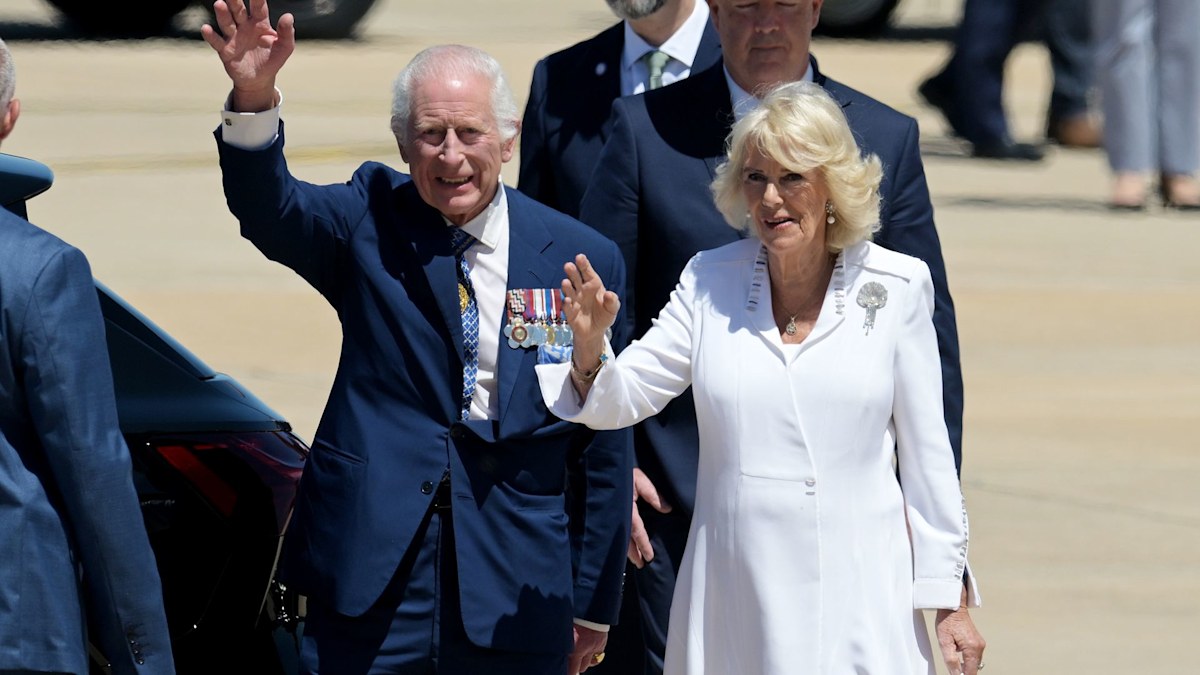 Queen Camilla stuns in elegant white silk dress as she and King Charles receive warm welcome in Canberra