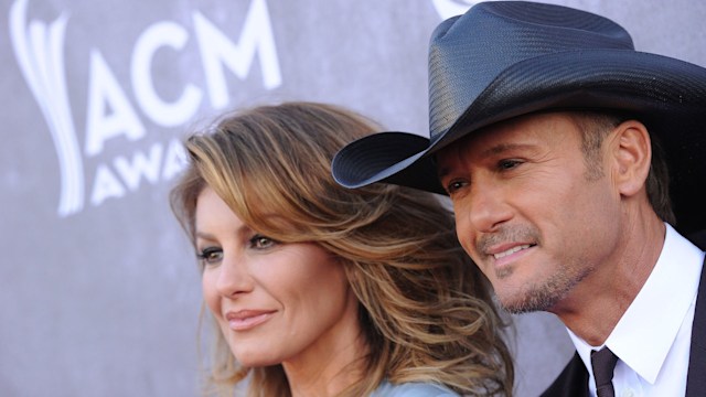 Singers Faith Hill (L) and Tim McGraw arrive at the 49th Annual Academy of Country Music Awards at the MGM Grand Hotel and Casino on April 6, 2014 in Las Vegas, Nevada.