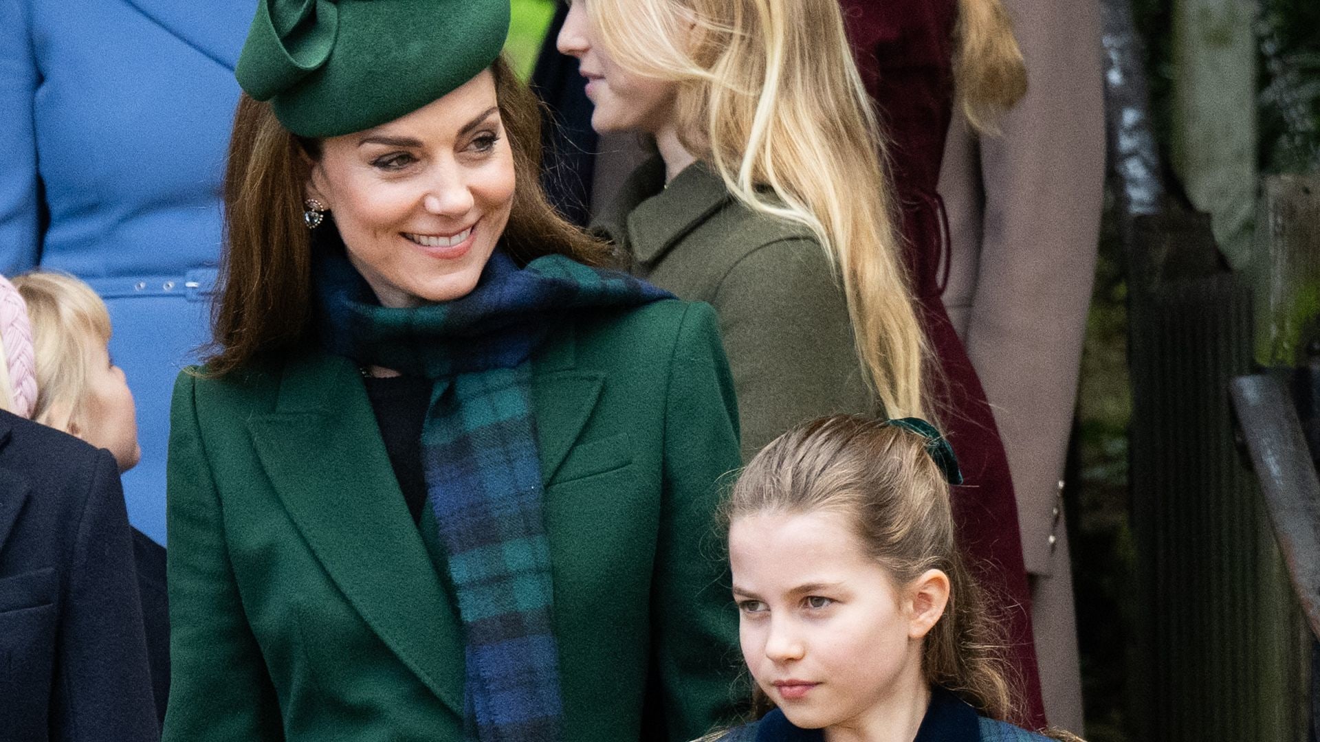 princesses kate and charlotte in coats outside