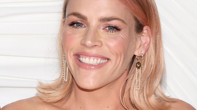 Busy Philipps wearing a yellow dress